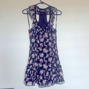 Mini racerback, fringe, floral dress by Guess. Like new condition.